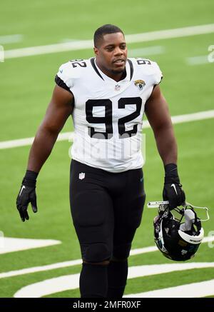 Jacksonville Jaguars defensive lineman Caraun Reid (92) heads off the field  after an NFL football game against the Los Angeles Chargers, Sunday,  October 25, 2020 in Inglewood, Calif. The Chargers defeated the