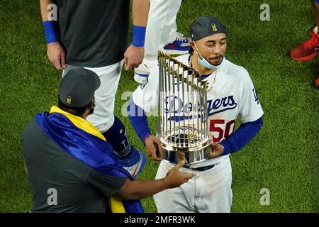 Los Angeles Dodgers' Mookie Betts celebrates a double against the Tampa Bay  Rays during the six …