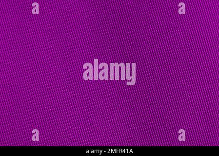 Close up view of purple fabric texture and background. Abstract background and texture for designers. Purple texture Stock Photo
