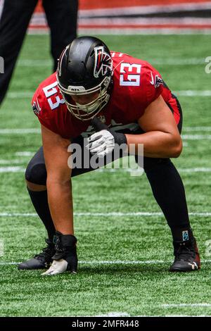 Atlanta Falcons guard Chris Lindstrom (63) on the sideline against