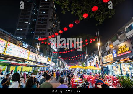 Kuala Lumpur, Malaysia - December 2022:  Jalan Alor street with restaurants and tourist near Bukit Bintang in Kuala Lumpur. Jalan Alor Stock Photo