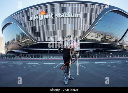 Kansas City Chiefs vs. Las Vegas Raiders. Fans support on NFL Game.  Silhouette of supporters, big screen with two rivals in background Stock  Photo - Alamy