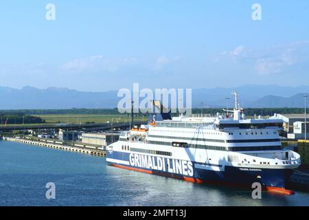 View on moored Passenger Ro-Ro ship with blue hull and white top operated by the Italian company Grimaldi Lines in port Livorno. Stock Photo