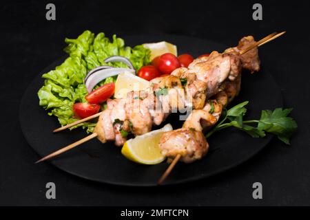 cooked meat veggies kebab high view Stock Photo