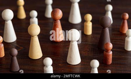 unique characters wooden background inclusion concept Stock Photo