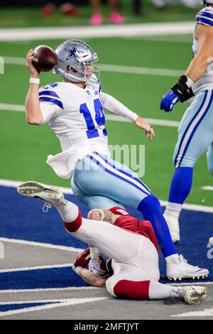 Landover, United States. 25th Oct, 2020. Dallas Cowboys quarterback Andy  Dalton (14) evades Washington Football Team linebacker Cole Holcomb (55)  during the first half of an NFL football game at FedEx Field