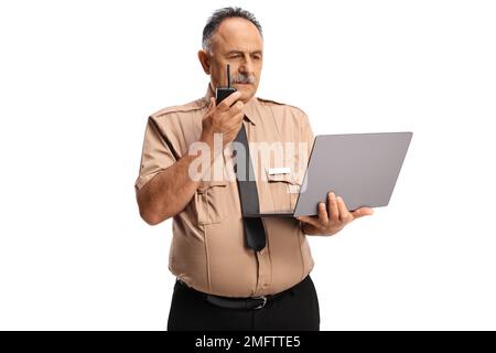 Security guard using a walkie talkie and looking at a laptop computer isolated on white background Stock Photo