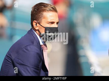 CBS sideline reporter Evan Washburn watches from the field during the first  half of an NFL football game between the Jacksonville Jaguars and the  Kansas City Chiefs Sunday, Sept. 8, 2019, in