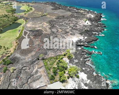 An aerial shot of a Golf course on the Kailua Kona coast in Big Island Hawaii Stock Photo