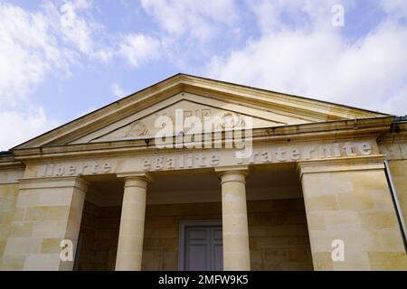 city hall in center france stone building with french text liberte egalite fraternite mairie means liberty equality fraternity town hall Stock Photo