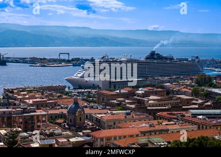 Aerial view of Messina city and port with MSC Seaview cruise ship at anchor. Stock Photo