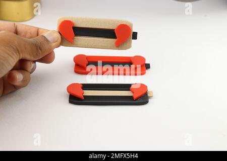 Valentine's day heart sliders made using 3d printing technology that makes it a unique gifting idea for anniversaries and other special days Stock Photo