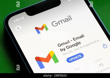 Gmail app is seen in the App Store on an iPhone. Gmail is a free email service provided by Google. Stock Photo
