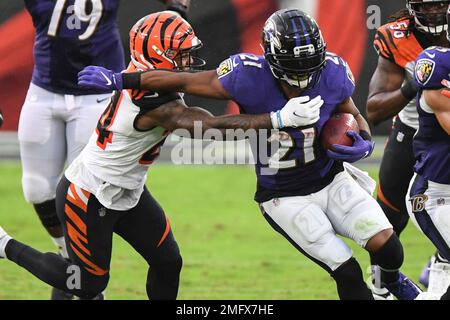 Baltimore Ravens tight end Mark Andrews (89) scores against Cincinnati  Bengals strong safety Vonn Bell (24) during the first half of an NFL  football game at M&T Bank Stadium in Baltimore, Maryland