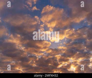 Orange and White Silver Lined Clouds High in the Sky at Diamond Head Waikiki Honolulu Oahu Hawaii USA Sunset Stock Photo