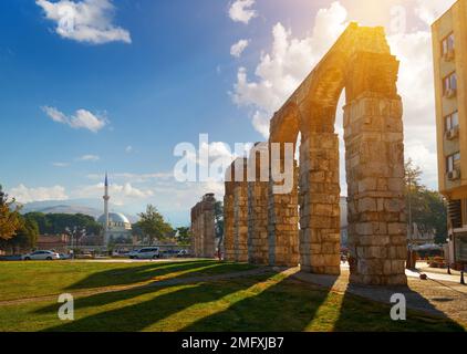 Ancient Byzantine aqueduct against a bright sunny sky in Selcuk city, İzmir Province, Turkey Stock Photo