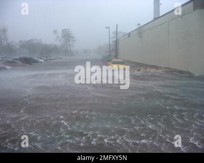 Aftermath - Keesler Damage - 26-HK-288-7. Hurricane Katrina View of D Street adjacent to Central Steam Plant. Hurricane Katrina Stock Photo