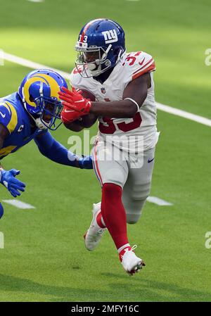 INGLEWOOD, CA - DECEMBER 25: Los Angeles Rams tight end Brycen Hopkins (88)  catches the ball for a gain during the NFL game between the Denver Broncos  and the Los Angeles Rams