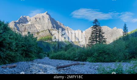 The morning panorama of north walls of Karwendel mountains - walls of Spritzkar spitze and Grubenkar spitze from Enger tall  - Grosser Ahornboden wall Stock Photo