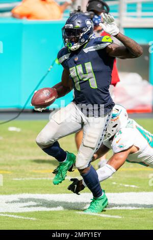 Seattle Seahawks wide receiver DK Metcalf (14) runs with the ball