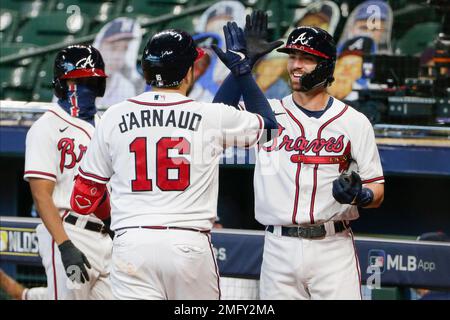 Atlanta, GA, USA. 04th July, 2019. Atlanta Braves shortstop Dansby Swanson  (left) kisses the head of infielder Ozzie Albies (right) after hitting an  eighth inning home run during a MLB game against