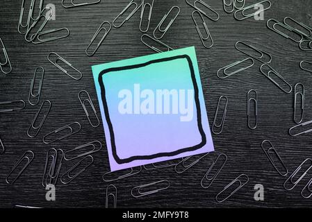 Paperclips Around Important Informations On Desk. Presented Recent Updates. Stock Photo