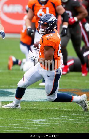 Denver Broncos tight end Noah Fant (87) runs with the football against the  Tampa Bay Buccaneers in the first half of an NFL football game, Sunday,  Sept.. 27, 2020, in Denver. (AP