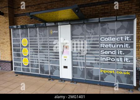 In Post,similar,to,Amazon,lockers,postal,service,for,collecting,returning,and,sending,packages,packs,boxes,for,general,public,usage,convenience,convenient,facility,facilities,at,outside,outdoors,self-service,Morrisons,Supermarket,Aberystwyth,with,large,student,population,West,Wales,Welsh,UK,United Kingdom,Great Britain,British,GB,Europe,European,these self service facilities, are sometimes found at petrol stations,motorway service areas and outside supermarkets. Stock Photo