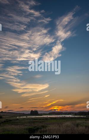 Landscape with interesting cloud formation on big sky over Gadloch in East Dunbartonshire, Kirkintilloch. Stock Photo