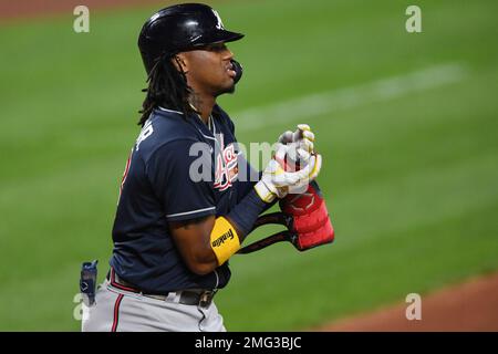 Atlanta Braves center fielder Terrance Gore can not handle a fly ball for a  double by Los Angeles Dodgers' Chris Taylor during the seventh inning in  Game 1 of baseball's National League