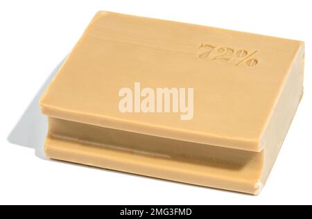 Rectangular brown laundry bar of soap on a white isolated background Stock Photo