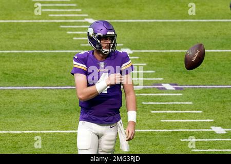 Green Bay, Wisconsin, USA. 02nd Jan, 2022. Minnesota Vikings quarterback  Sean Mannion #14 throws a pass during NFL football game between the  Minnesota Vikings and the Green Bay Packers at Lambeau Field