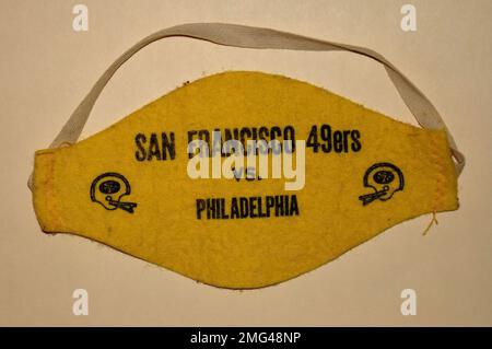 San Francisco 49ers vs. Philadelphia Eagles football teams, armband for photographers' access to sidelines at Candlestick Park, California, in the 1980s Stock Photo