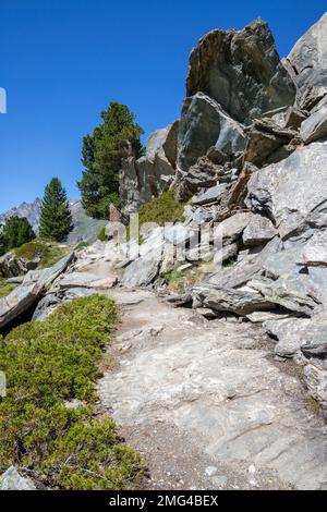 The dramatical slate rocks in Walliser aslps over the Mattertal valley. Stock Photo