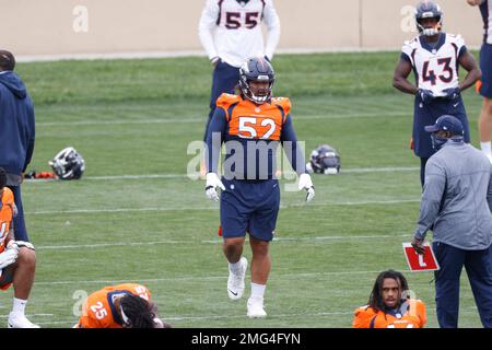 Denver Broncos guard Netane Muti (52) on the field before the start of an  NFL football game against the Los Angeles Chargers, Sunday, January 2, 2022  in Inglewood, Calif. The Chargers defeated