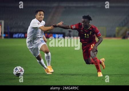 BRUSSELS, BELGIUM - December 08: Jeremy Doku of Anderlecht and Maxime Busi  of Charleroi fight for the ball during the Jupiler Pro League match day 18  between Rsc Anderlecht vs Sporting Charleroi