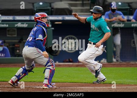 Texas Rangers catcher Jose Trevino (23) in the ninth inning of a baseball  game Thursday, June 3, 2021, in Denver. The Rockies won 11-6 to sweep the  three-game series. (AP Photo/David Zalubowski