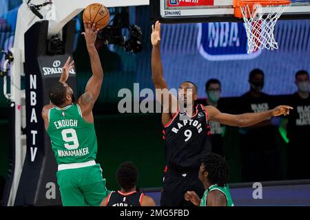 Toronto Raptors center Serge Ibaka (9) shoots over Indiana Pacers center  Myles Turner (33) during the first half of an NBA basketball game in  Indianapolis, Wednesday, Jan. 23, 2019. (AP Photo/Michael Conroy