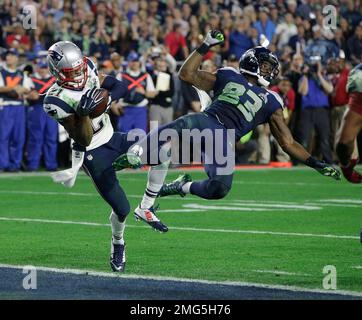 New England Patriots strong safety Duron Harmon (30) intercepts the pass  intended for Philadelphia Eagles tight end Trey Burton (88) during the  second quarter of Super Bowl LII at U.S. Bank Stadium