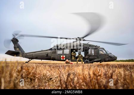 January 5, 2023 - Joint Base McGuire-Dix-Lakehurst, New Jersey, USA - A New Jersey Army National Guard UH-60L Black Hawk, with Charlie Company, 1-171st General Support Aviation Battalion, prepares for take-off at Joint Base McGuire-Dix-Lakehurst, New Jersey, January. 5, 2023. (Credit Image: © Michael Schwenk/U.S. Army/ZUMA Press Wire Service) EDITORIAL USAGE ONLY! Not for Commercial USAGE! Stock Photo