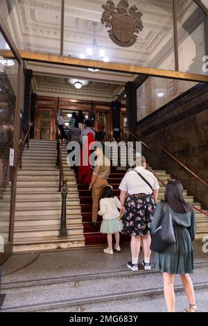 Melbourne, Australia. 26th Jan, 2023. A diverse group of citizens-to-be gather outside Melbourne Town Hall on 26 January, Australia Day, eagerly awaiting the start of their citizenship ceremony. Credit: Michael Currie/Speed Media/Alamy Live News Stock Photo