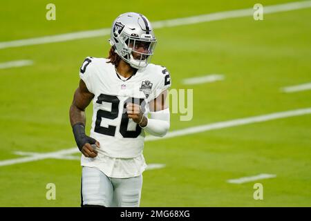 Las Vegas Raiders cornerback Damon Arnette #20 celebrates after a fumble  recovery by cornerback Nevin Lawson #26 during the second half against the Denver  Broncos during an NFL football game, Sunday, Nov.