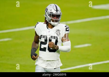 Las Vegas Raiders cornerback Damon Arnette #20 celebrates after a fumble  recovery by cornerback Nevin Lawson #26 during the second half against the Denver  Broncos during an NFL football game, Sunday, Nov.