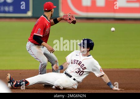 Houston Astros' Kyle Tucker is safe at second on a fielding error by  Atlanta Braves second baseman Ozzie Albies during the sixth inning in Game  2 of baseball's World Series between the