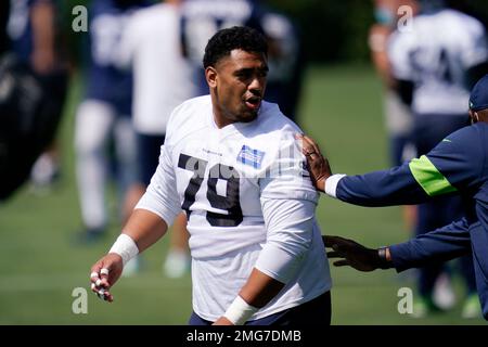 Seattle Seahawks nose tackle Bryan Mone (91) walks on the field