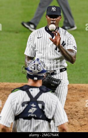 New York Yankees on-deck batter Erik Kratz (38) celebrates with teammate  Thairo Estrada, right, after Estrada hit a solo home run during the fourth  inning of a baseball game, Monday, Aug. 17