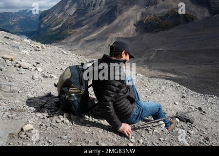 Man Sliding on Steep Slope in the Mountain Stock Photo - Alamy
