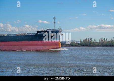 NEW ORLEANS, LA, USA - DECEMBER 28, 2022: Bow the Crimson Ark bulk carrier ship travelling upriver on the Mississippi River Stock Photo