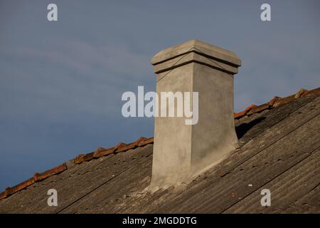 New roofing construction with attic skylights, rain gutter system, roof windows and roof protection from snow board, snow guard exterior. Stock Photo