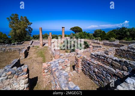 Walls and columns of a former cathedrale, historical remains and ruins of the Area archeologica di Tindari. Stock Photo